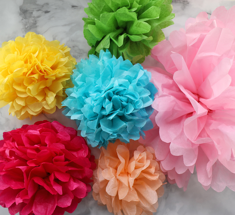 garland making with paper flowers
