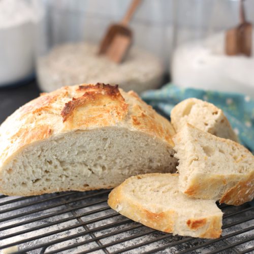 Fresh crusty loaf of artisanal homemade bread baked in a Lodge Dutch oven  cast iron pot in an doven at high temperatures Stock Photo - Alamy