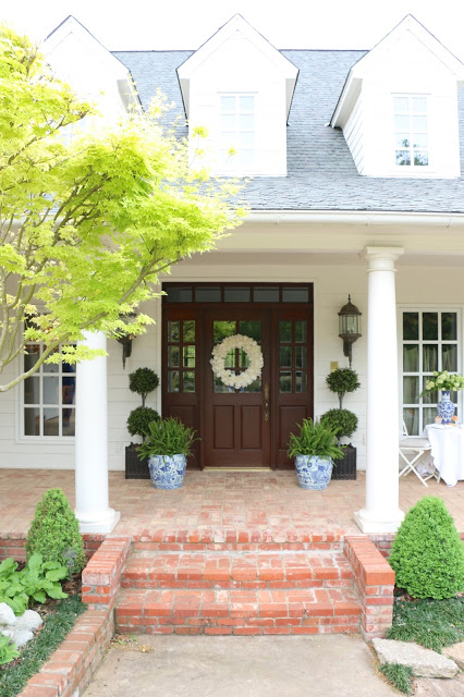 porch topiaries in square planters