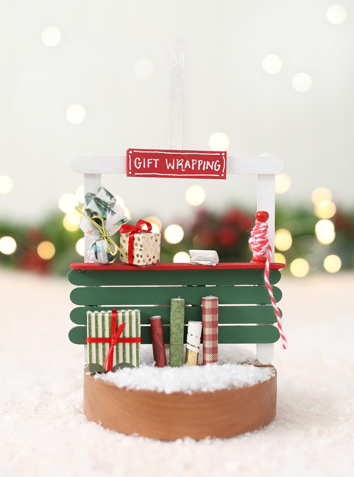 gift wrapping station popsicle stick christmas ornament