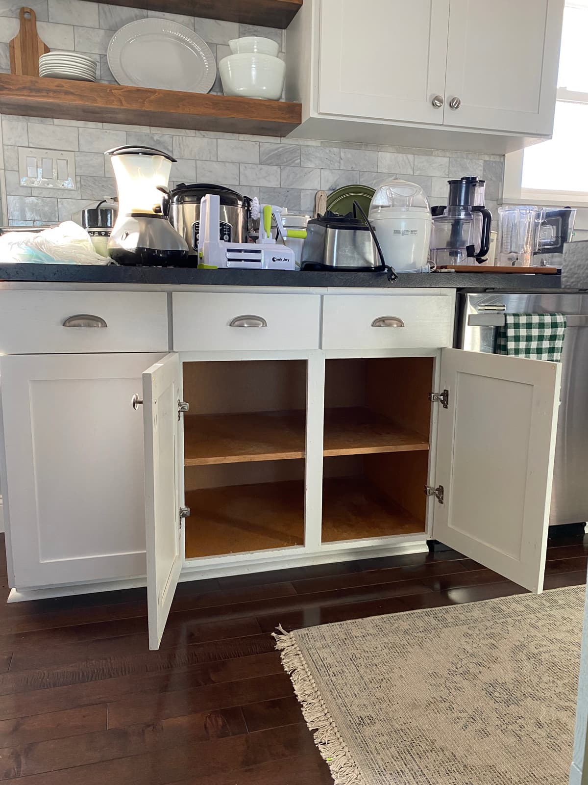 changing a kitchen cupboard into one with pull out drawers