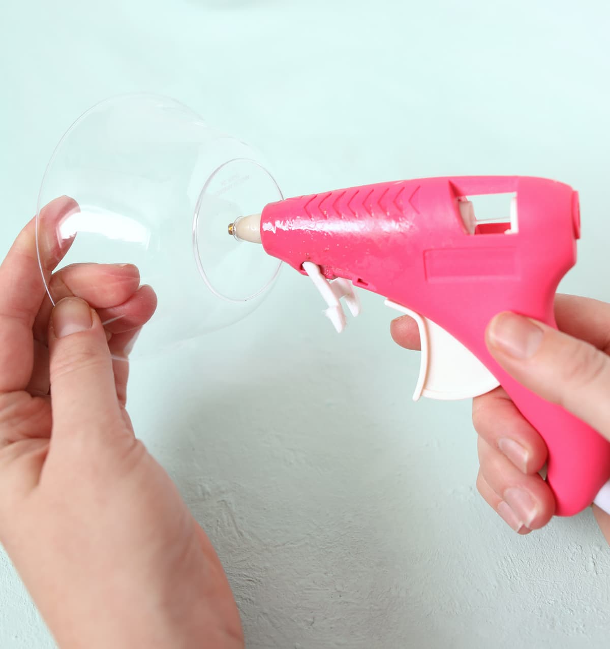 melt a hole using a glue gun